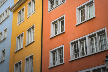 Fototapeta na wymiar Colorful Facade with Windows and Shutters, Zurich Switzerland