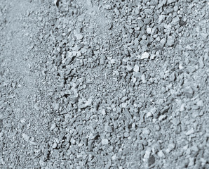 Sand with gravel as a building material.