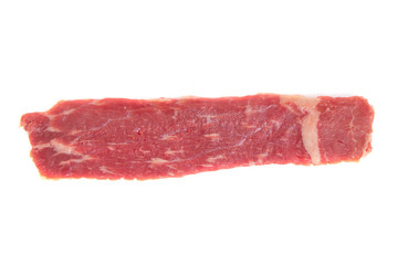 piece of raw beef meat on a white background