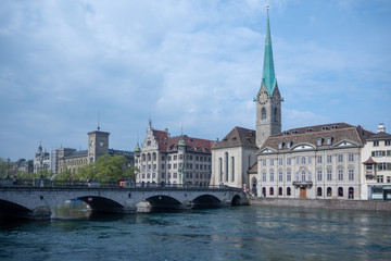 Fototapeta na wymiar The Fraumunster and Münsterbrücke famous beautiful landmark with cloudy sky background , copy space , Zurich , Switzerland