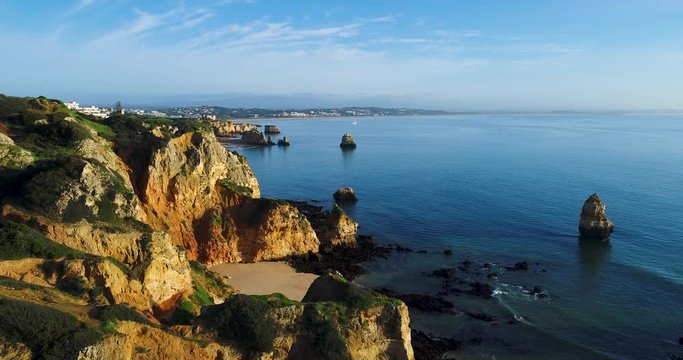 Aerial beautiful view of the Camilo and D. Ana beaches in the coast of Lagos, Algarve, Portugal