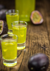 Fresh Passion Fruit Liqueur as detailed close-up shot (selective focus)
