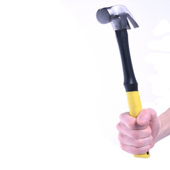 Hand holds hammer isolated on white background