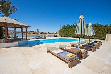 Swimming pool at at luxury tropical holiday villa resort