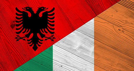 Flag of Albania and Ireland on wooden boards