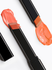 lipstick orange tones smudges black commercial beauty look feminine female isolated white