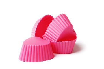 silicone mold for baking on a white background. Culinary accessories of the baker. Small baking cups. It is isolated.