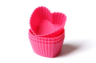 silicone mold for baking on a white background. Culinary accessories of the baker. Small baking cups. It is isolated.