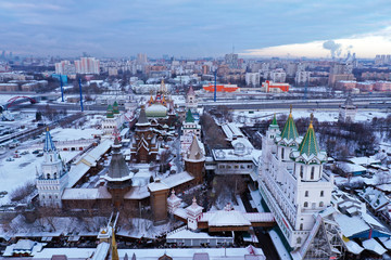 Fototapeta premium cityscape shot from a quadrocopter in winter at sunrise