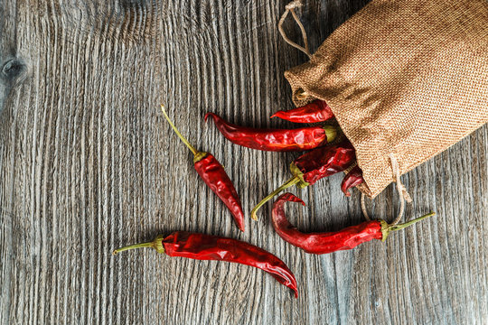 mexican food. dried red hot chilli pepper on wooden background. spicy taste