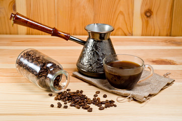 Copper cezve for brewing tasty and aromatic coffee on an open fire.