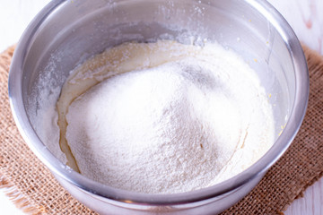 Flour in a metal bowl