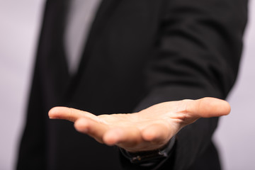 Businessman without head holding something without theme