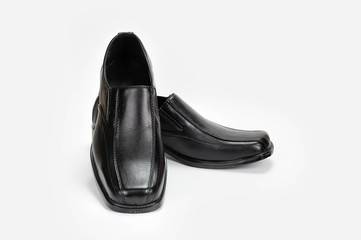 Black leather shoes For business men On a white background.