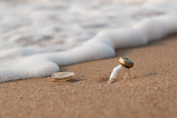 A glass bottle on the beach