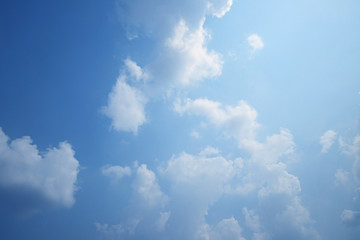 blue sky with beautiful  fluffy clouds for background