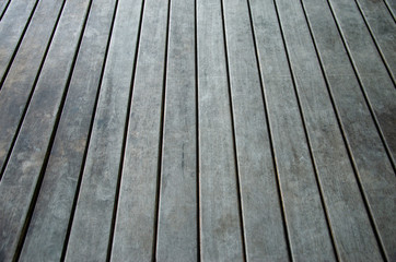 Old wood floor with blurred patterned background