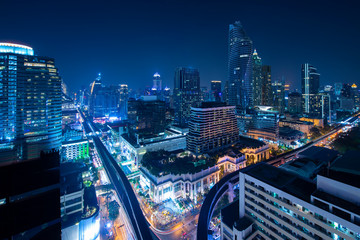 Fototapeta na wymiar Bangkok skyline downtown district at night in blue hour.