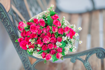 Close-up flower view(pink, red rose)that is beautifully decorated as a bouquet, placed on the table or garden to give on special days(Valentine,wedding)