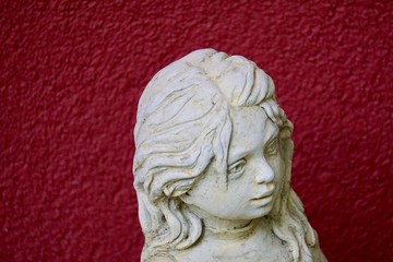statue of an angel on white background