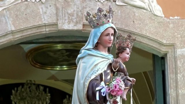 Our Lady statue on the churchyard after the annual procession. 