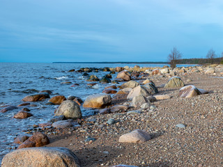 landscape with a rocky beach in the evening
