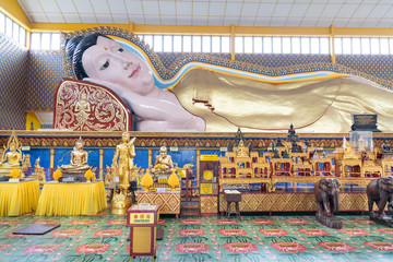 Wat Chaiya Mangalaram with popular reclining sleeping Buddha is popular tourism destination in Penang