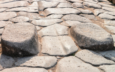 Paved stones at Via Stabiana in ancient city Pompeii
