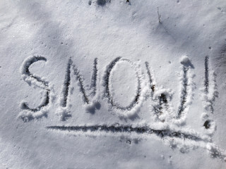 Snow text word on white sunny winter mood day