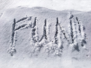 Snow text fun word on white sunny winter mood day