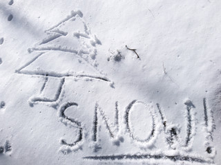 Snow text word on white sunny winter mood day