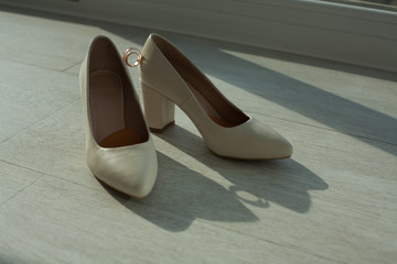 wedding rings and shoes