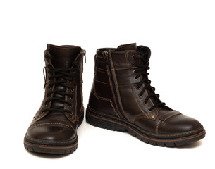 warm boots with fur inside, brown color, isolated on a white background