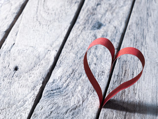 Valentines day background with red paper heart handmade on wooden texture background