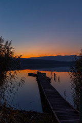 Fototapeta premium fishing boat at pier on Jenoi pond near Diosjeno, Northern Hungary