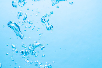The bubbles under the blue water