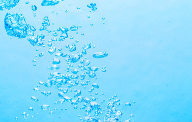 The bubbles under the blue water
