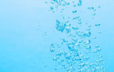 The bubbles under the blue water