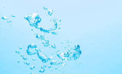 The bubbles under the blue water