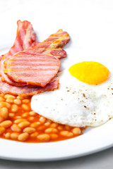 English breakfast with bacon beans and egg