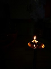 An oil lamp in black background