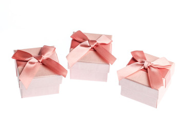 Gift boxes with bows isolated on white background.