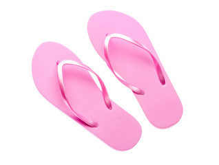 Pink plastic flip-flops isolated on a white background.
