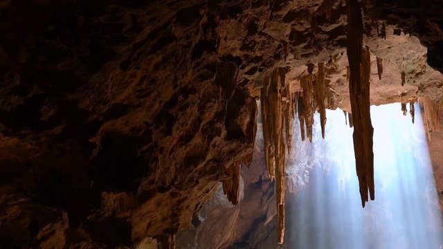 pan and zoom video of Light from the cave. The nature wonderful tourist attraction of Thailand, the place of Khao Luang Cave, Phetchaburi Province.