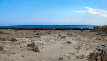 Fototapeta na wymiar Rocky beach of Mediterranean Sea