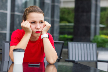 Lonely offended bored sad upset girl, young beautiful frustrated woman in bad mood sitting in cafe...
