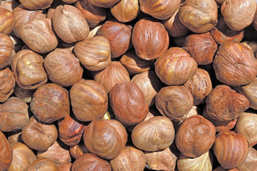 peeled hazelnuts in bulk. close up. top view.