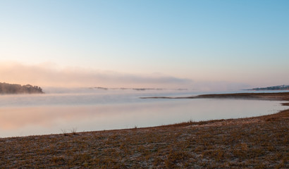 morning mist at the reservoir Montargil Ponte de Sor Alentejo Portugal
