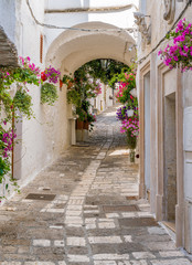 Scenic sight in Ostuni on a sunny summer day, Apulia (Puglia), southern Italy. 