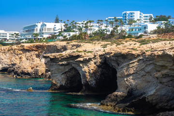 Fototapeta premium Cyprus. Resort of Ayia Napa. Resorts off the coast. Rocky seashore. Vacation spot in Cyprus. Tourist beaches in Cyprus. Lagoon. Resorts of the Mediterranean Sea. Holiday in Ayia Napa resort